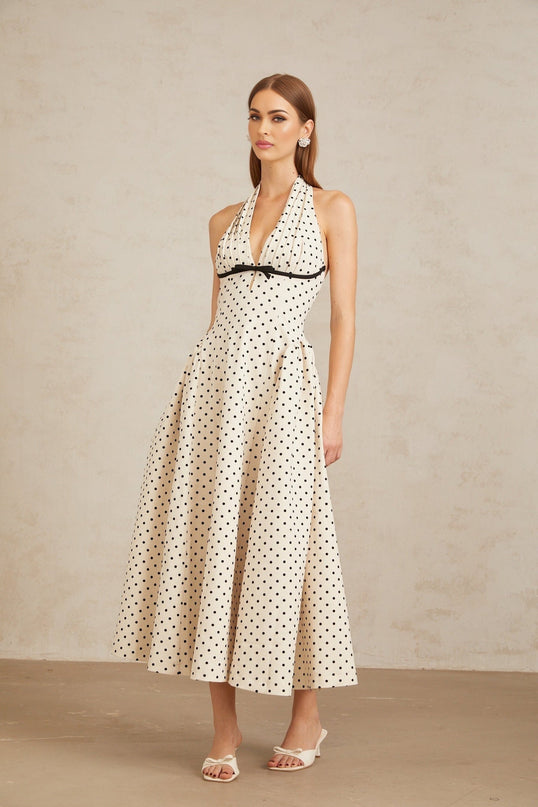 Ornella Midi Dress in White with Black Polka Dots halterneck open back bow embellishment puff skirt calf-length hemline rear button zip fastening