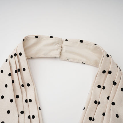 Ornella Midi Dress in White with Black Polka Dots sartorial masterpiece halterneck open back bow embellishment polka-dot print puff skirt sophisticated silhouette bow detailing calf-length hemline rear button zip fastening special occasions classic charm contemporary style