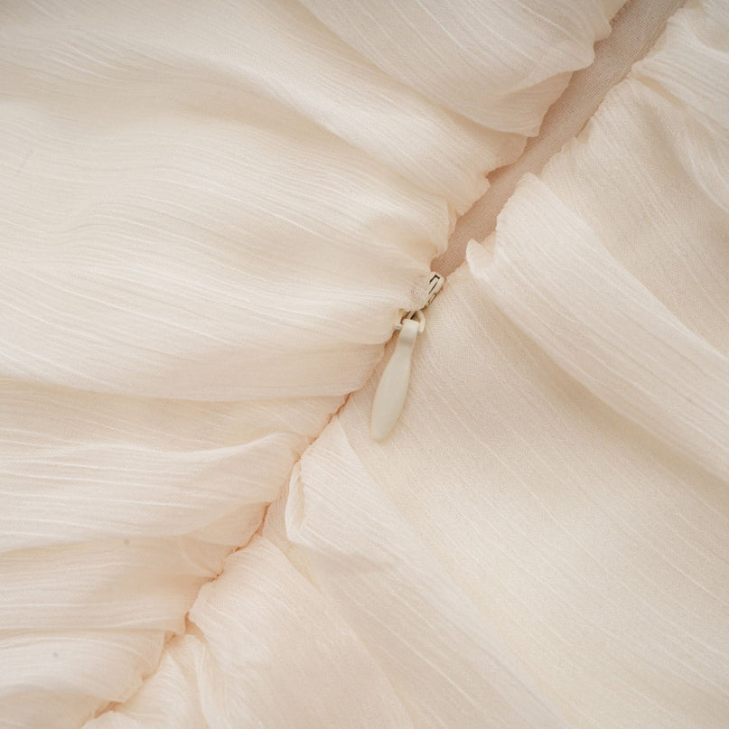 Paola Neutrals Mini Dress mock neck long puff sleeves buttoned cuffs tuck detailing gathered design fully pleated skirt rear zip fastening thigh-length luxurious blend Terylene fiber Spandex timeless beauty