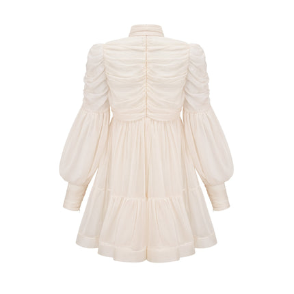 Paola Neutrals Mini Dress mock neck puff sleeves tuck detailing pleated skirt rear zip fastening luxurious blend Terylene Spandex timeless beauty