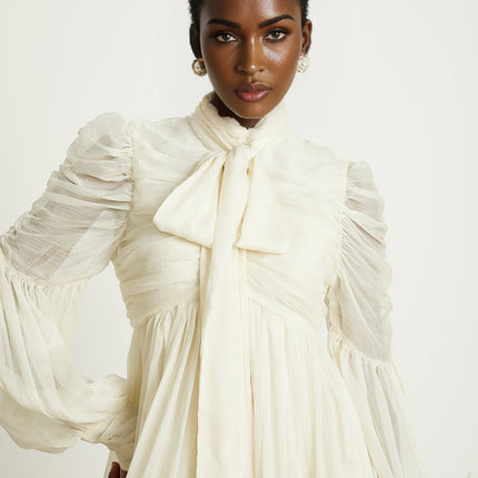 Paola Neutrals Mini Dress mock neck puff sleeves tuck detailing pleated skirt Spandex