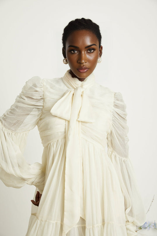 Paola Neutrals Mini Dress mock neck puff sleeves tuck detailing pleated skirt Spandex