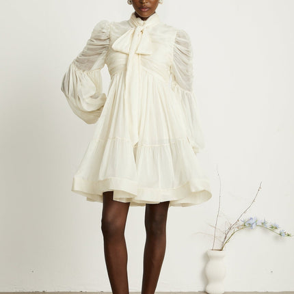 Paola Neutrals Mini Dress mock neck puff sleeves tuck detailing pleated skirt Spandex blend elegance sophistication beauty