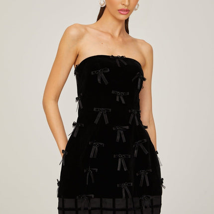 Paolina Black Mini Dress Off Shoulder Bow Detail A-Line Flared Skirt 100 Polyester Special Occasions Evening Events Feminine Sophisticated Timeless Style Luxurious Craftsmanship Wardrobe Essential