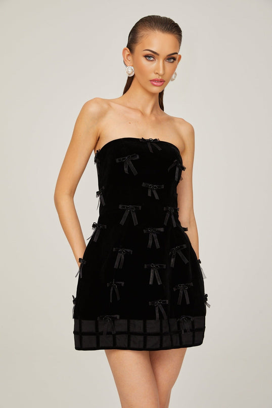 Paolina Black Mini Dress Off Shoulder Bow Detail A-Line Flared Skirt 100 Polyester Special Occasions Evening Events Feminine Sophisticated Timeless Style Luxurious Craftsmanship Wardrobe Essential