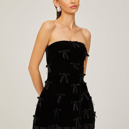 Paolina Black Mini Dress Off-Shoulder Bow Detail A-Line Silhouette Polyester Special Occasions Evening Events Feminine Sophisticated Timeless Style Luxury Craftsmanship Wardrobe Essential