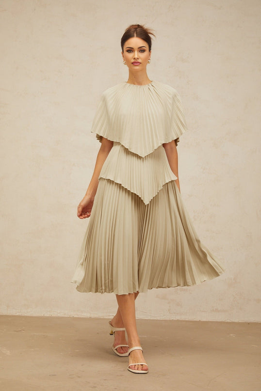 Paolina Midi Dress in sophisticated neutrals with cape design and pleated detailing