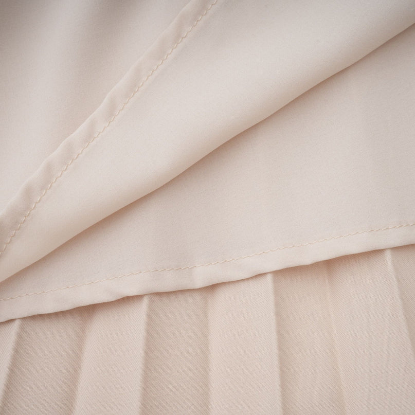 Paolina Midi Dress in Neutrals with Cape Design and Pleated Detailing