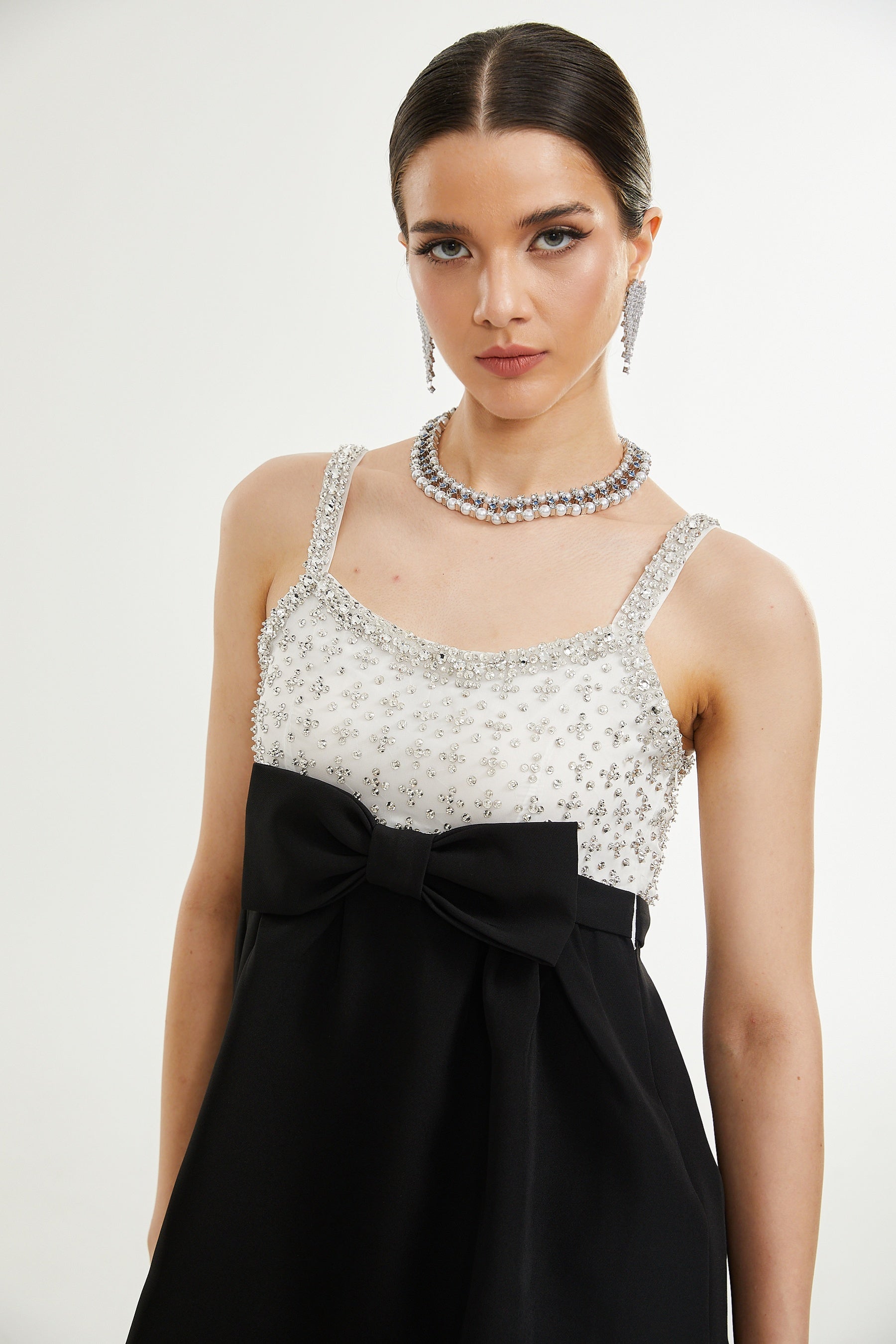 Parisa crystalembellished bowknot mini dress