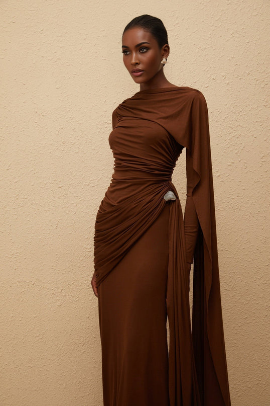 Pasqualina Maxi Dress Brown Knit Bateau Neck Long Sleeves Ruched Detailing Asymmetrical Ribbon Design Silver-tone Hardware Straight Hem Side Zip Fastening Maxi Length Tencel Spandex Comfort Style