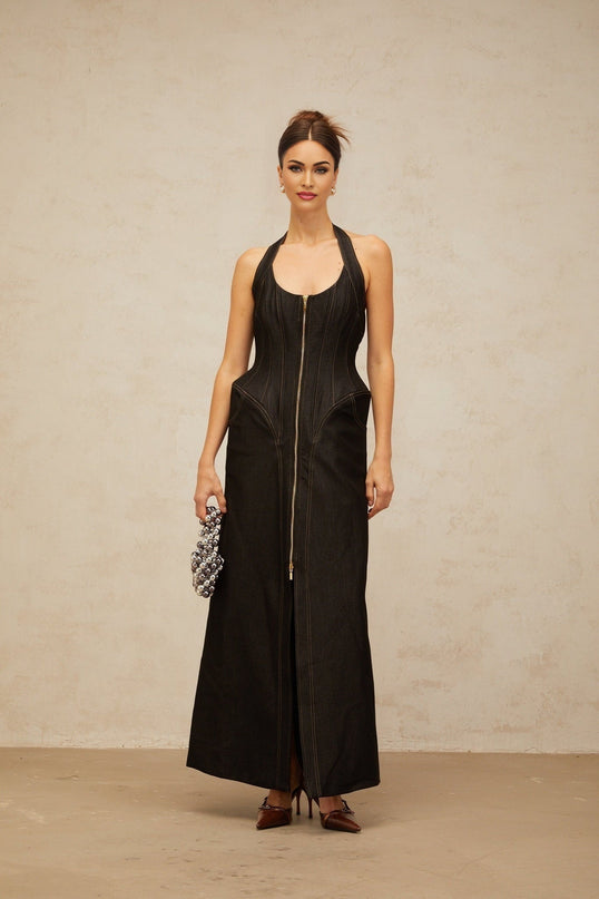 Perlina Black Maxi Dress Halterneck Front Slit Contrast Stitching Sleeveless Boned bodice Cinched waist Front rear zip fastening Maxi length 55% Nylon 45% Cotton luxury sophistication