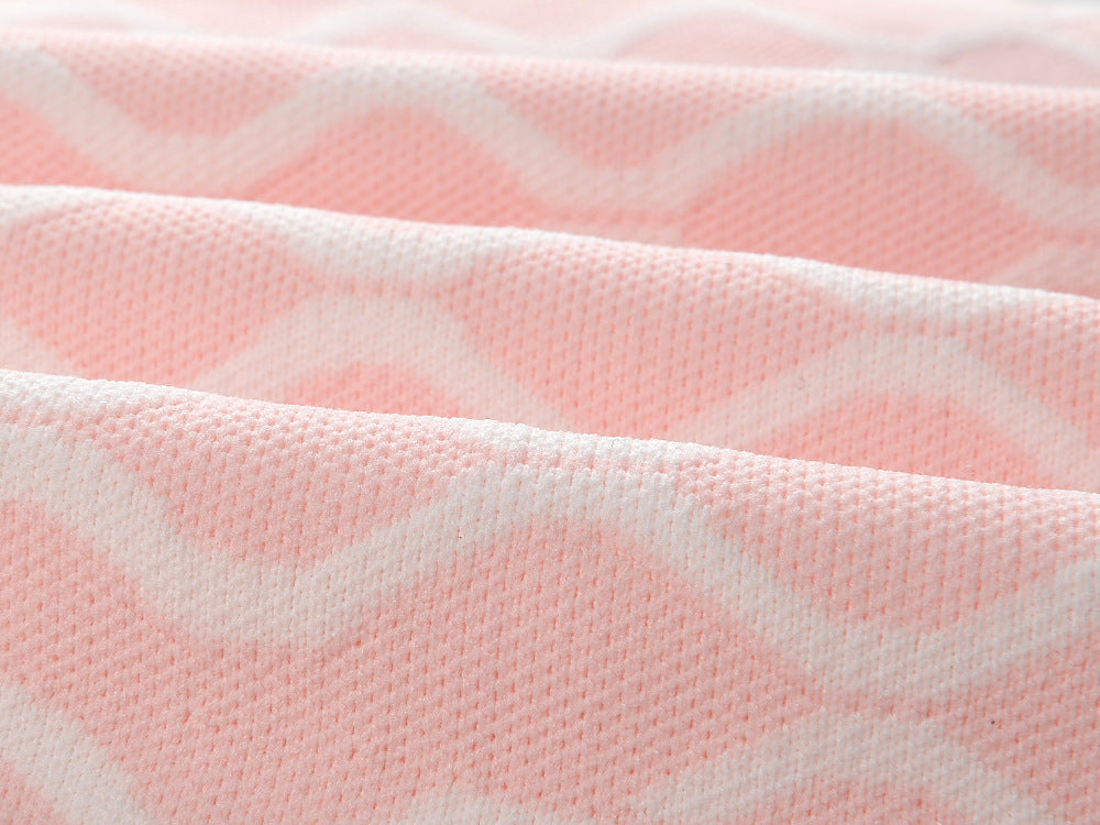 Pink A-line dress with abstract wavy pattern in soft pink and white accents tailored for hourglass shape