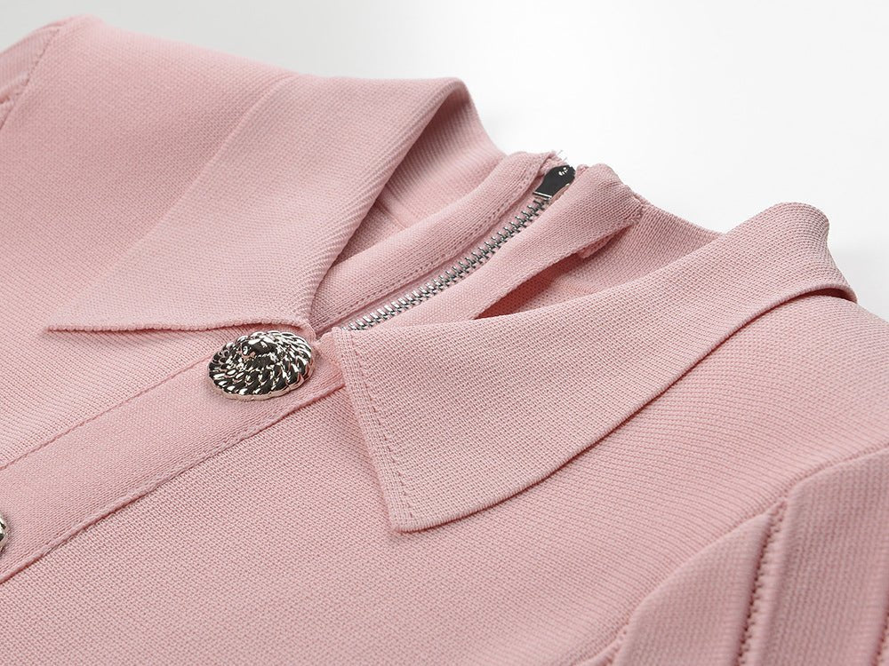 Pink A-line silhouette dress with long sleeves and decorative buttons in soft pastel shade