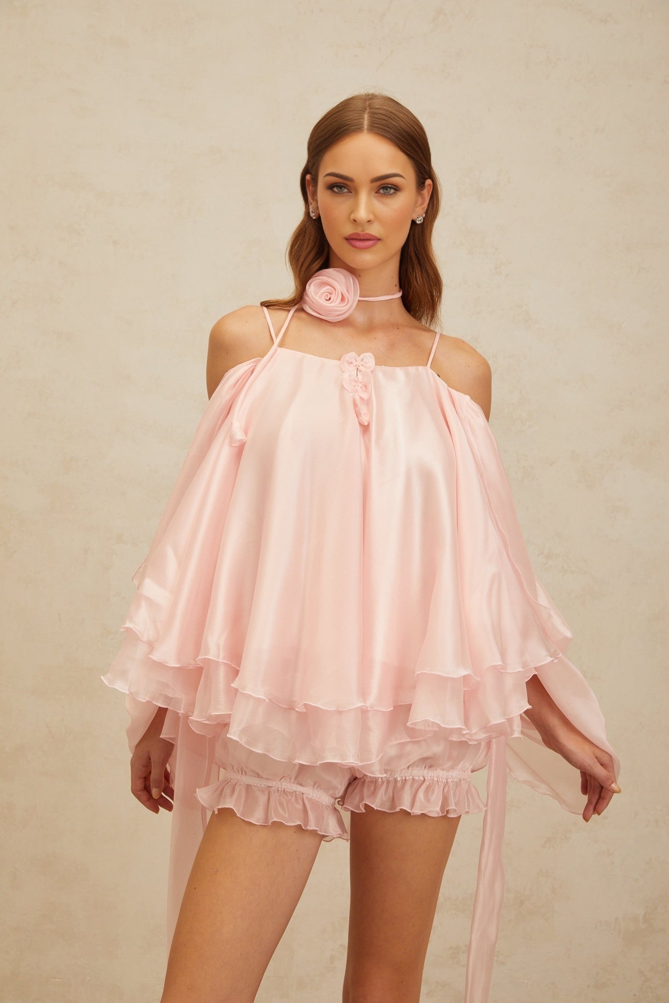 Pink cold shoulder tulle top with 3D-petal detailing and layered design