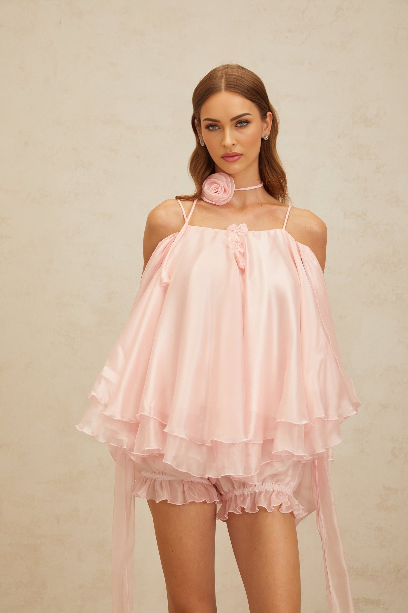 Pink cold shoulder tulle top with 3D-petal and ruffled detailing