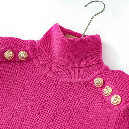 Pink fitted ribbed knit sweater with high neck design and decorative buttons on shoulders