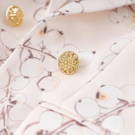 Pink Floral Blazer with Gold Buttons on Light Pastel Background