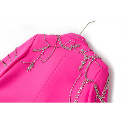Oversized double-breasted pink coat with floral detailing