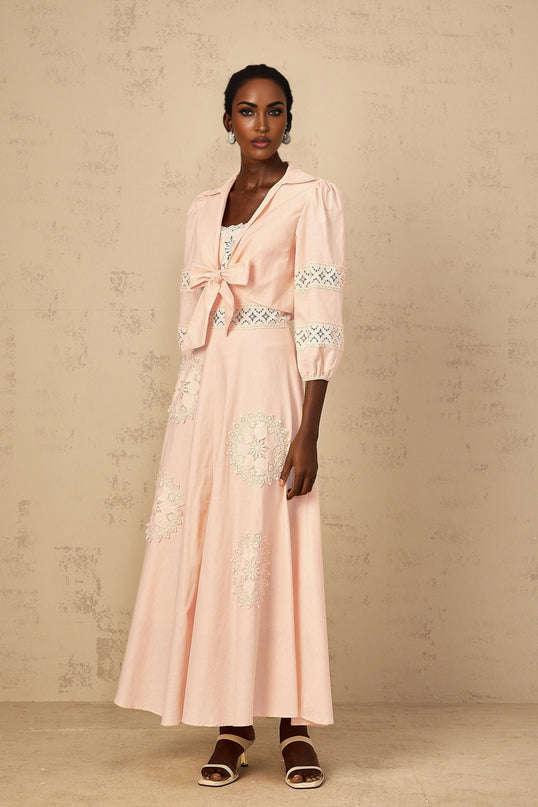 Pink floral embroidered blouse and dress set for girls named Romy featuring delicate floral patterns on a light pink background