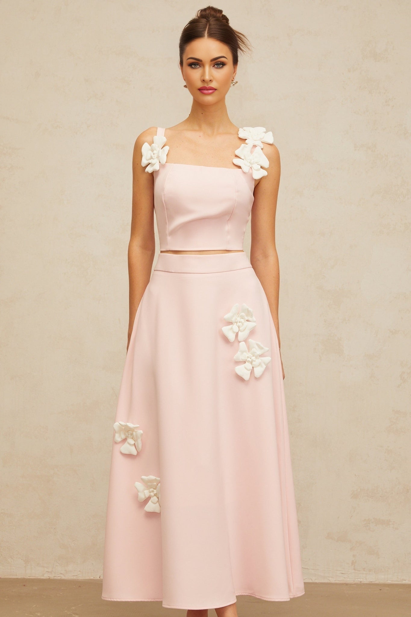 Pink floral matching set with applique details featuring a top and skirt