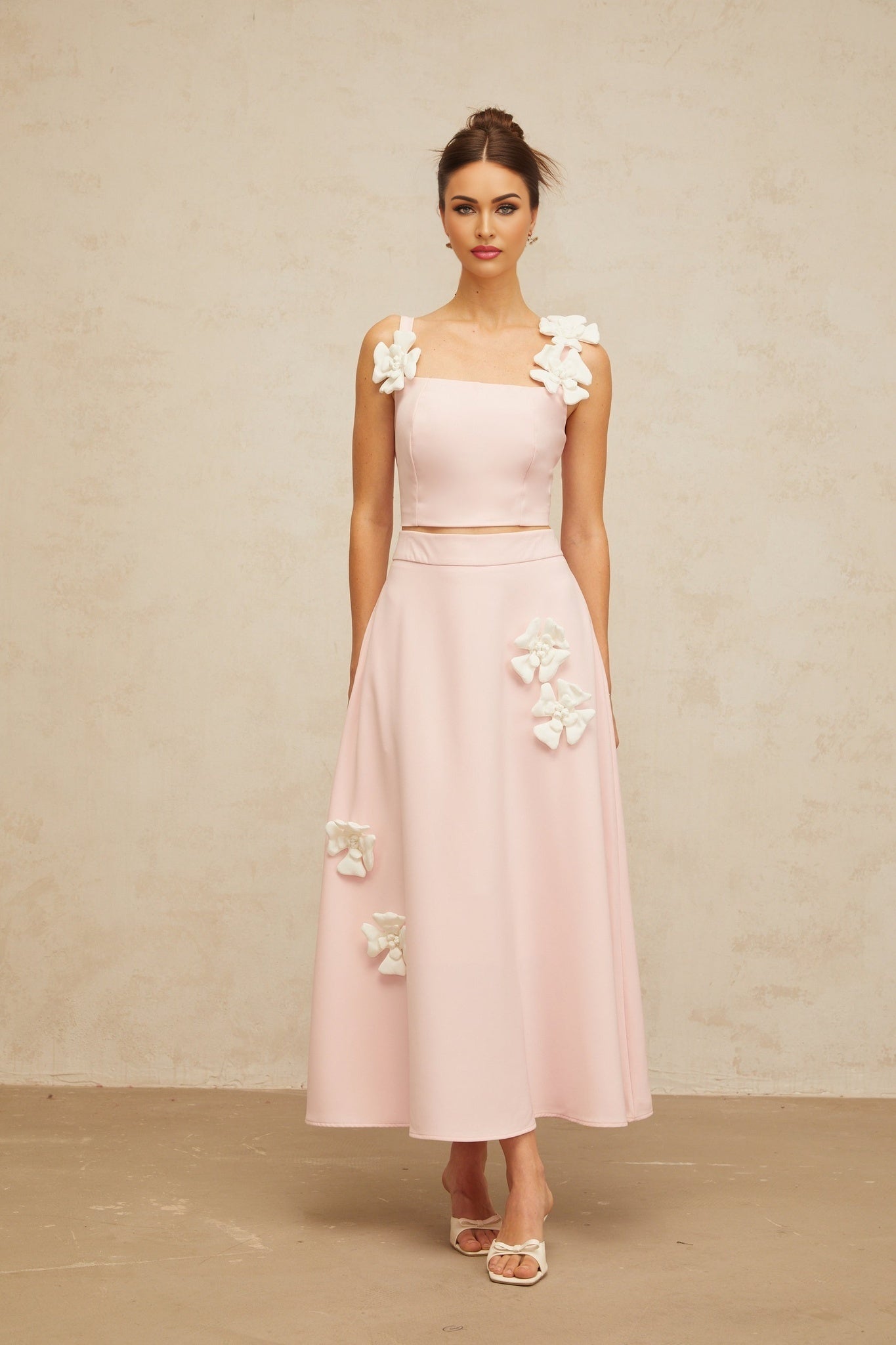 Pink floral matching set with applique details featuring a top and skirt