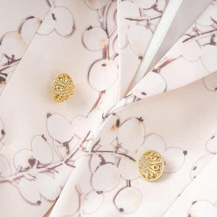 Pink Floral Pattern Blazer with Gold Buttons on Light Pastel Background