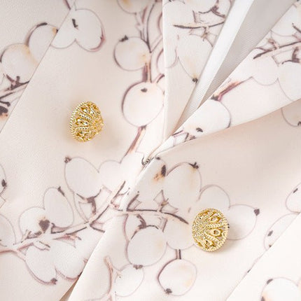 Pink Floral Pattern Blazer with Gold Buttons on Light Pastel Pink Background