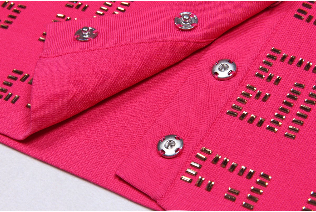 Pink geometric cutout cardigan and mini skirt with gold details