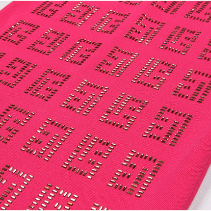 Fitted pink geometric cutout dress with metallic accents