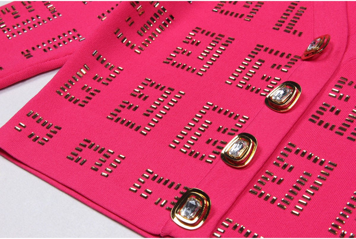 Pink fitted cardigan and mini skirt with geometric cutouts and gold details