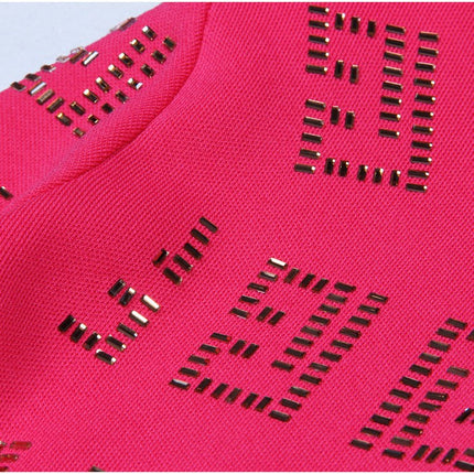 Pink geometric patterned cutout dress with metallic accents