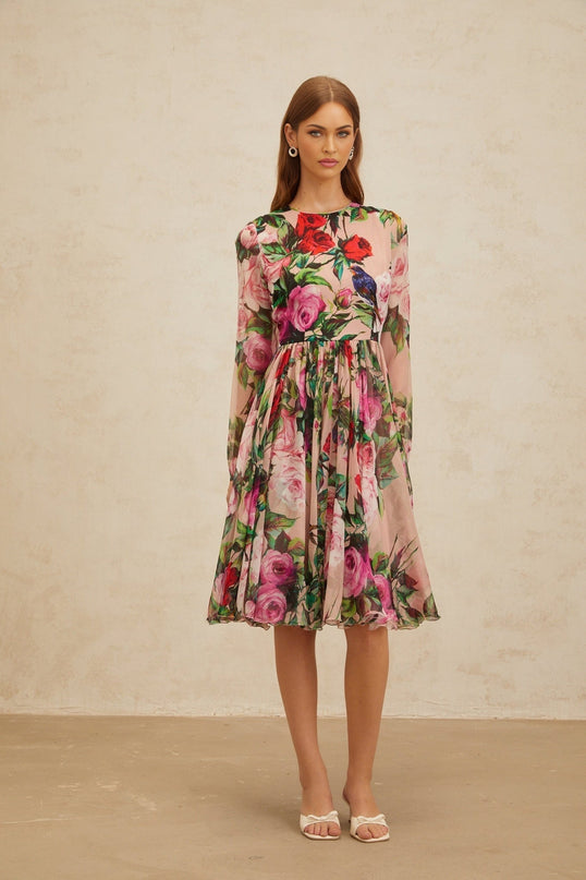 Pink long sleeve silk midi dress with rose print and shirred panel