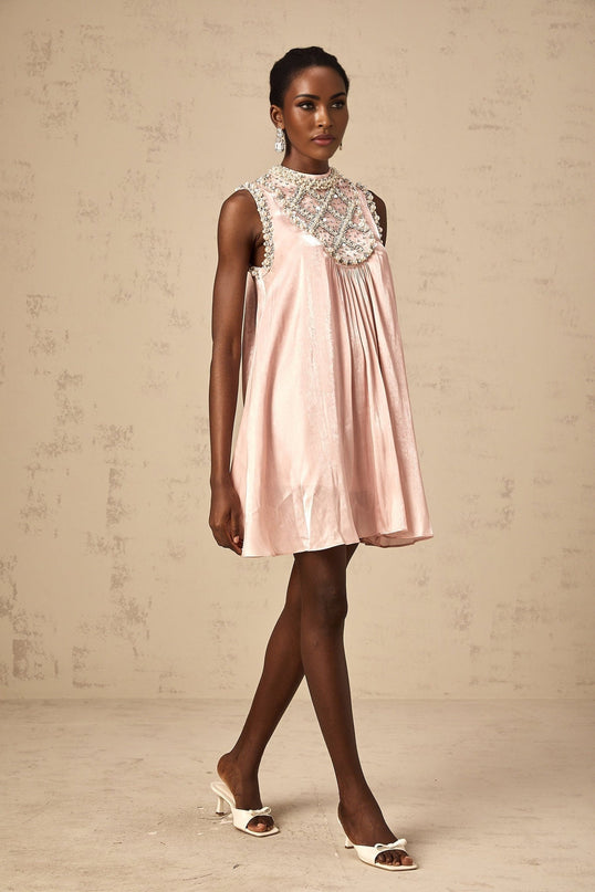 Pink mini dress with pleated skirt and embellished details named Helena