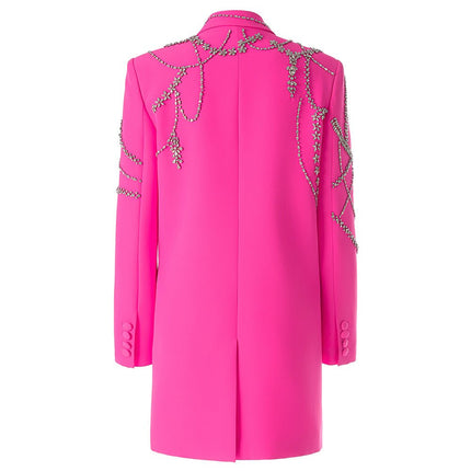 Oversized double-breasted pink coat with floral embellishments and rhinestone accents