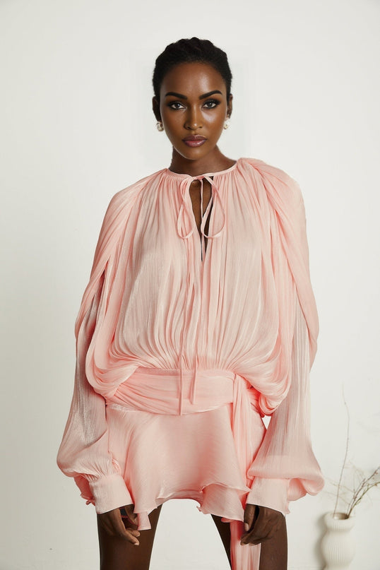 Pink pleated mini dress with ruffles and full skirt named Eugenie