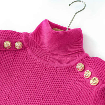 Pink ribbed knit sweater with high neck design and decorative buttons on shoulders