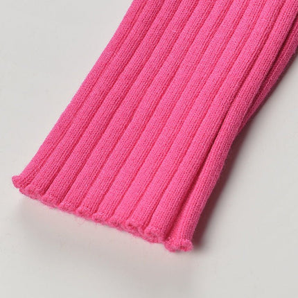 Slim fitted hot pink ribbed texture top with gold-button accents and chain trim