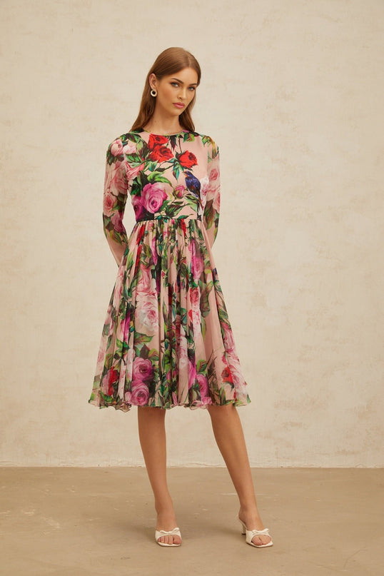 Pink silk rose print midi dress with long sleeves and shirred panel