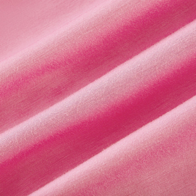 Pink sleeveless maxi dress with bow and artificial flower embellishment named Magali