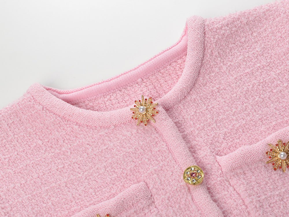 Pink textured fabric button-up top and tailored skirt