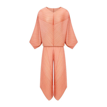 Pink spandex polyester blend V-neck blouse and pants set for women