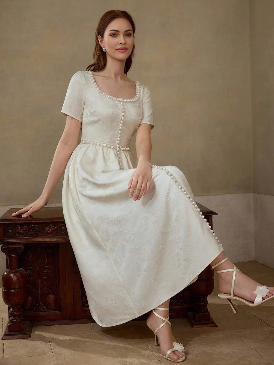 PREMIUM JACQUARD FABRIC CREAM COLOR PEARL DIAMOND DECOR SQUARE NECK SHORT SLEEVE CINCHED WAIST