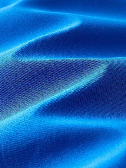 PREMIUM PLUS SIZE SOLID RUCHED WAIST ASYMMETRICAL RUFFLE HEM DRESS