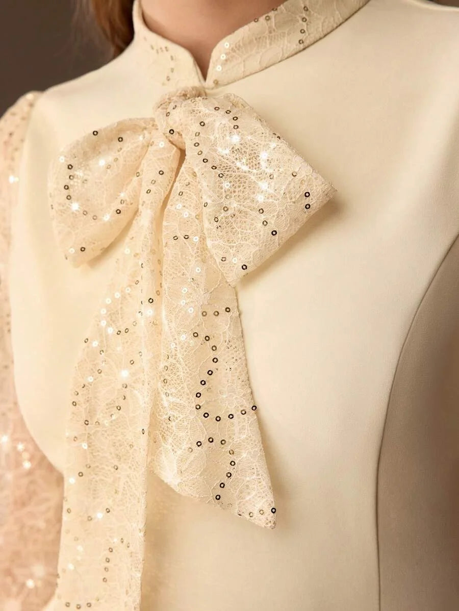 PREMIUM SEQUIN LACE PANEL BOW MOCK NECK FLARE HEM MIDI DRESS