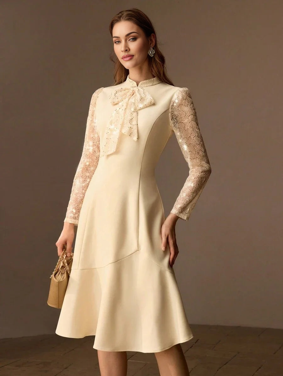 PREMIUM SEQUIN LACE PANEL BOW MOCK NECK FLARE HEM MIDI DRESS