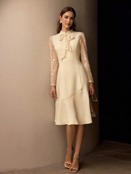 PREMIUM SEQUIN LACE PANEL BOW MOCK NECK FLARE HEM MIDI DRESS