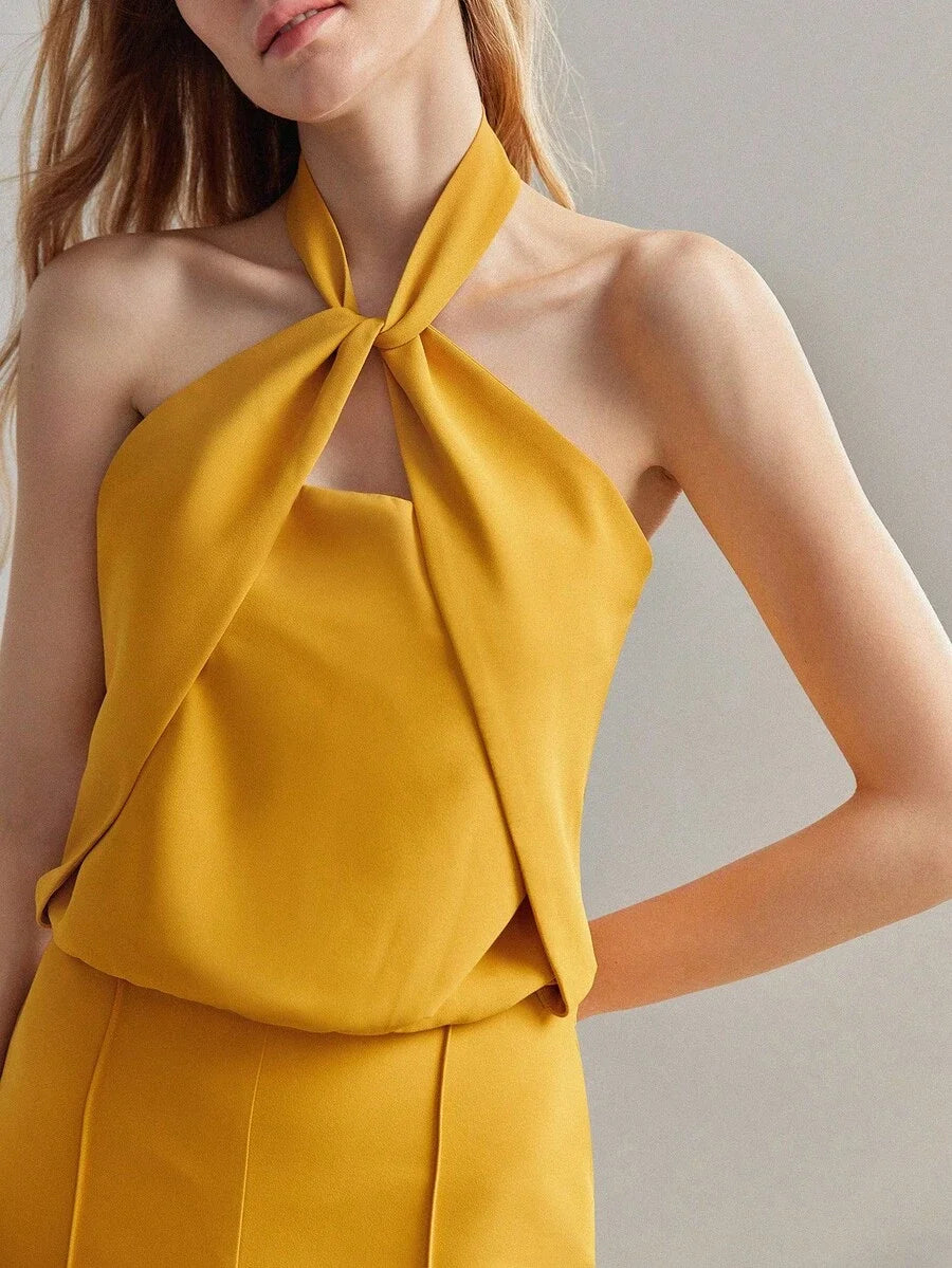 PREMIUM SOLID SEAM FRONT TWIST HALTER NECK FLARE LEG JUMPSUIT