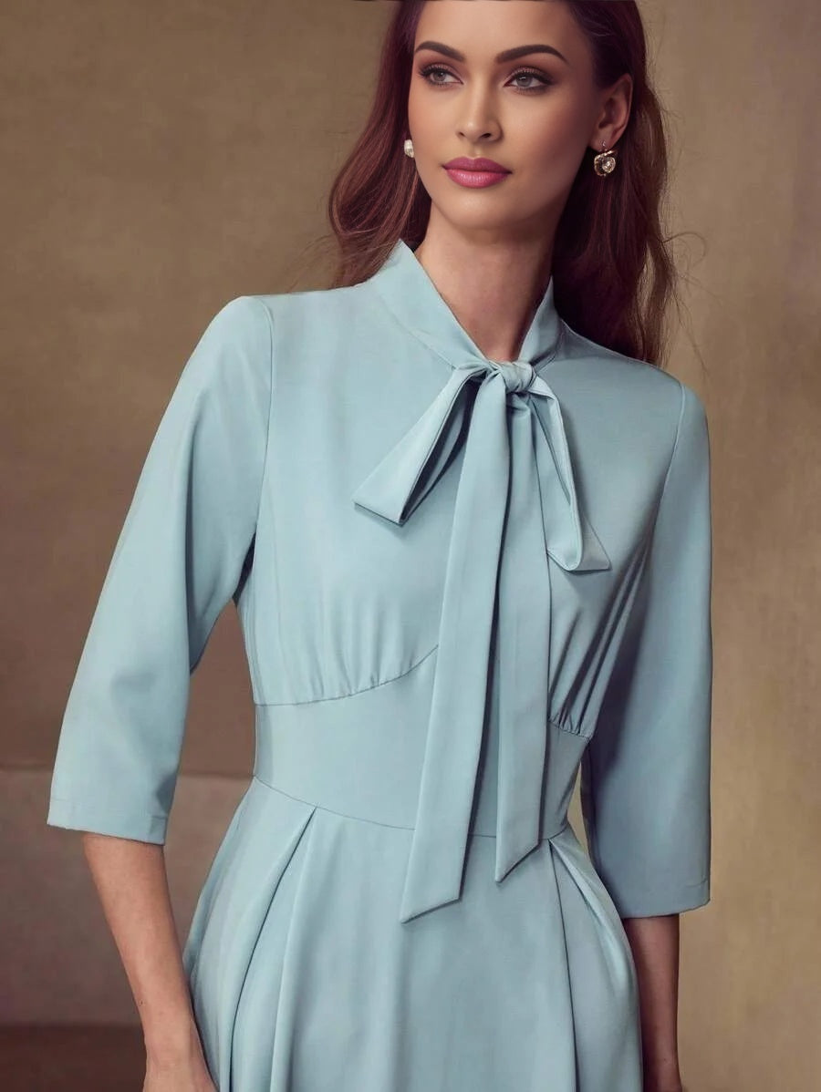 PREMIUM TIE NECK FLARED HEM DRESS