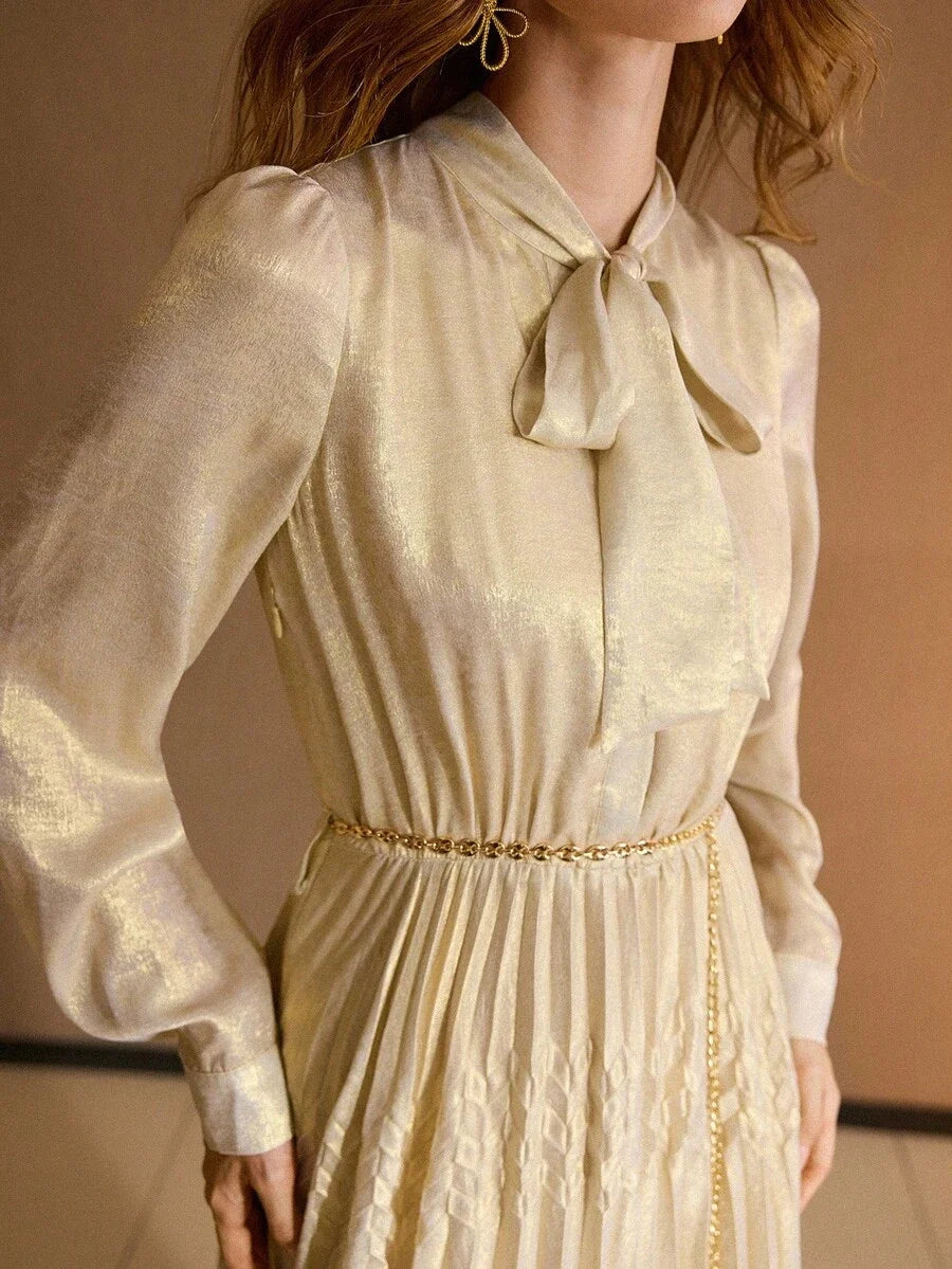 PREMIUM TIE NECK LANTERN SLEEVE PLEATED DRESS WITH CHAIN BELT
