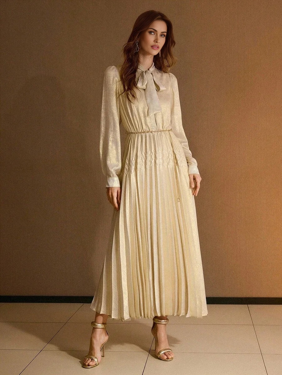 PREMIUM TIE NECK LANTERN SLEEVE PLEATED DRESS WITH CHAIN BELT